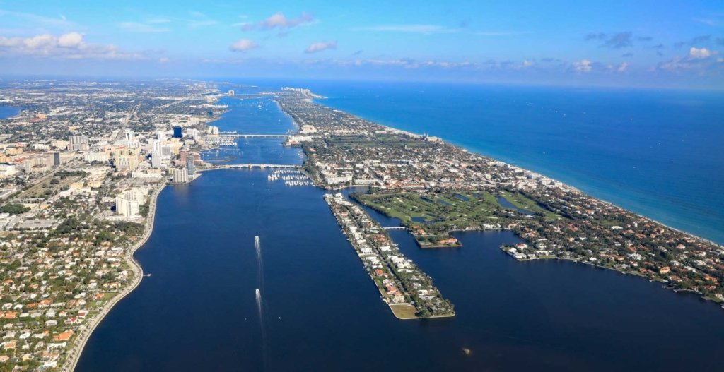 Aerial view of downtown West Palm Beach, Florida, with the Lake Worth Lagoon, and Palm Beach, in South Florida