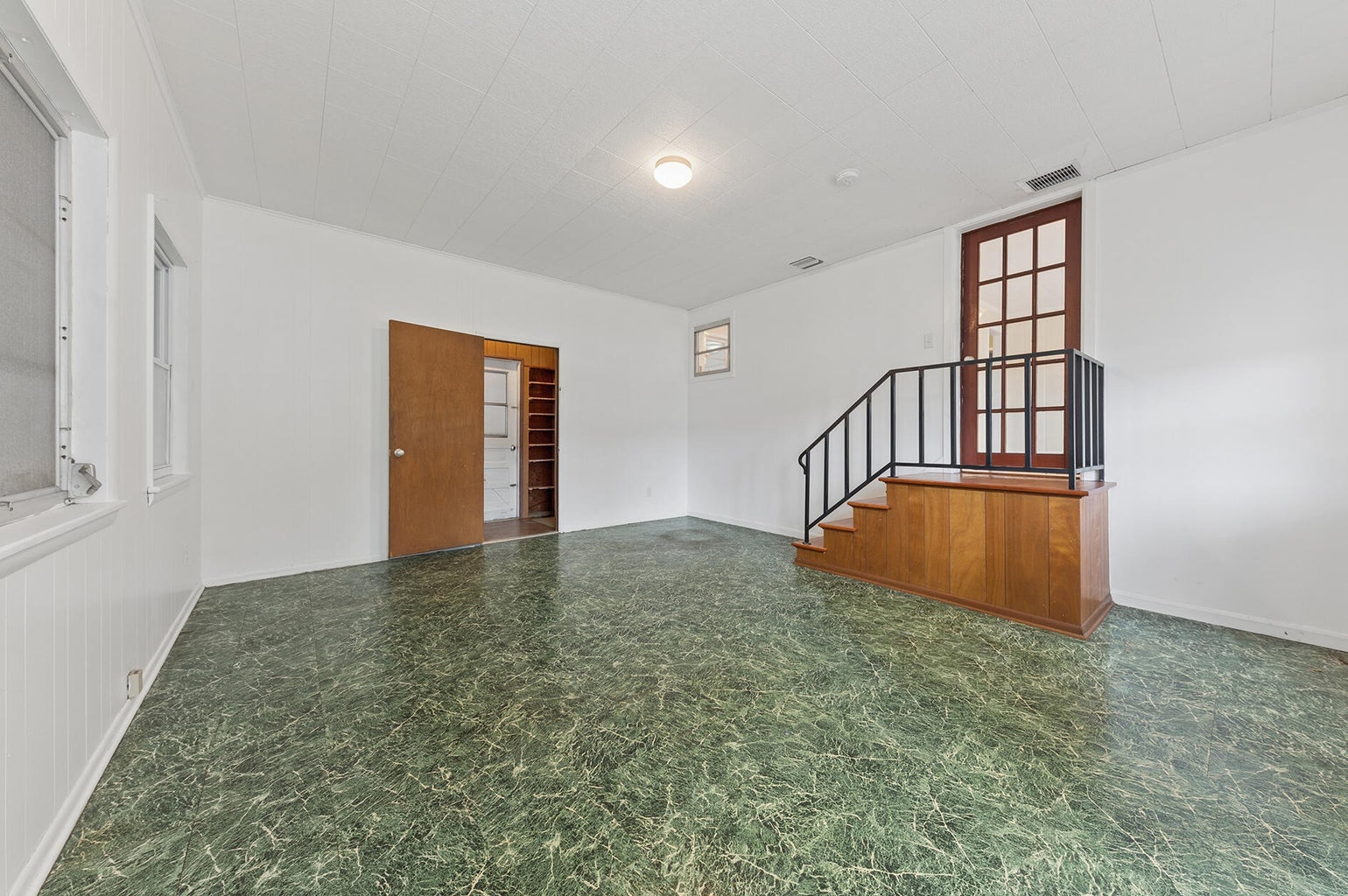 521 SW Halpatiokee Street bonus room with green floors